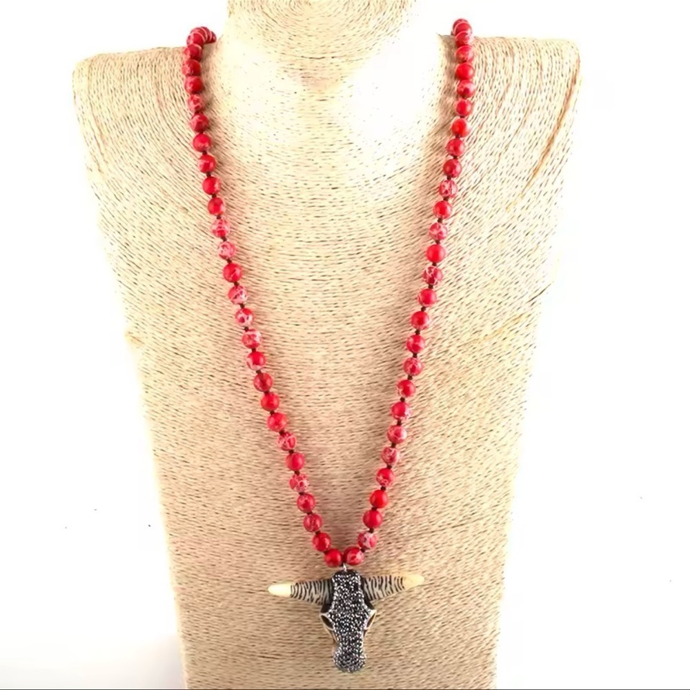Bohemian Bull Skull Long Knitted Red Natural Stones Necklace
FINE CRAFTMANSHIP - Picture 3 of 4